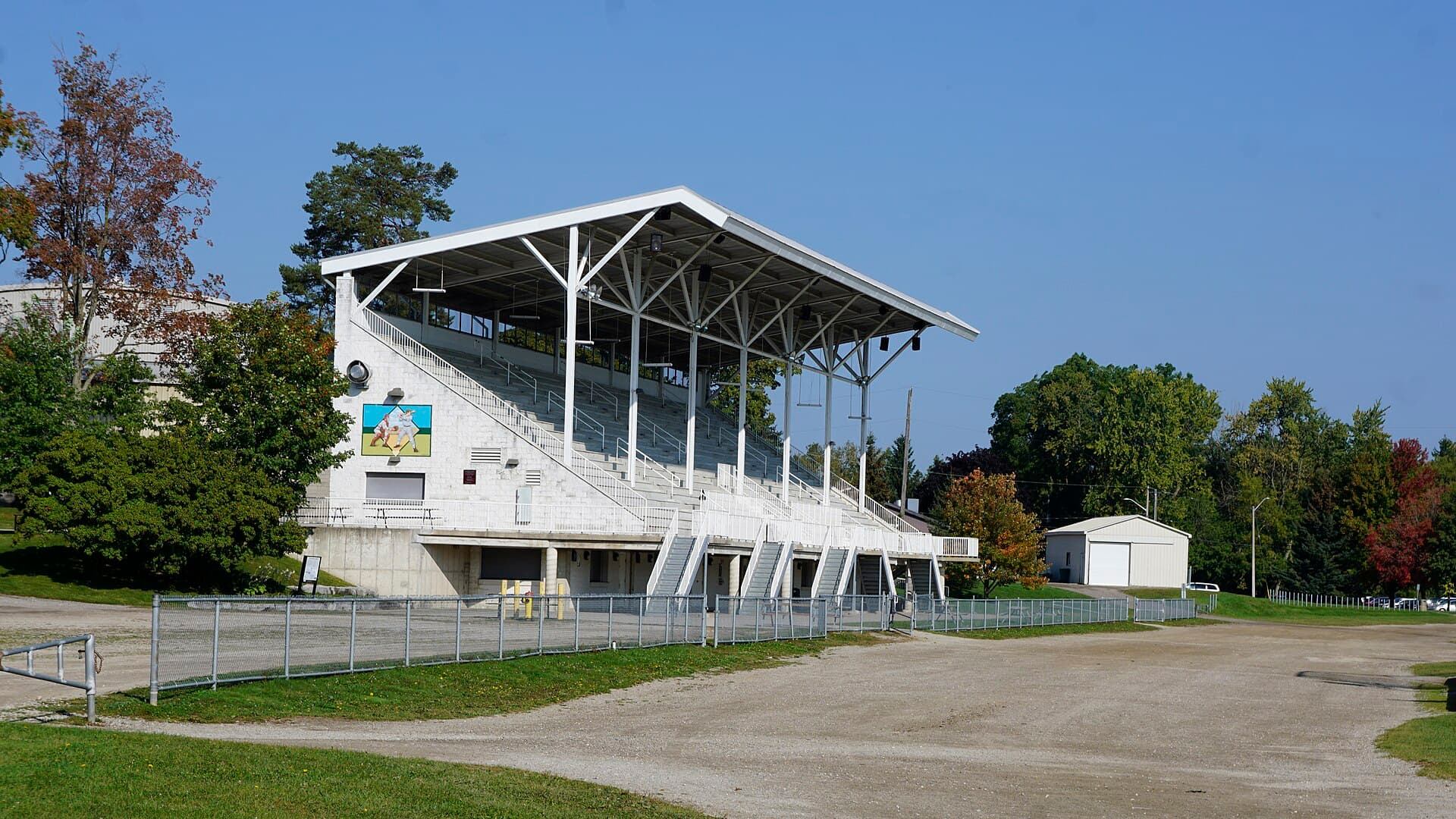 The New Hamburg fairgrounds grandstand under a clear early-autumn sky